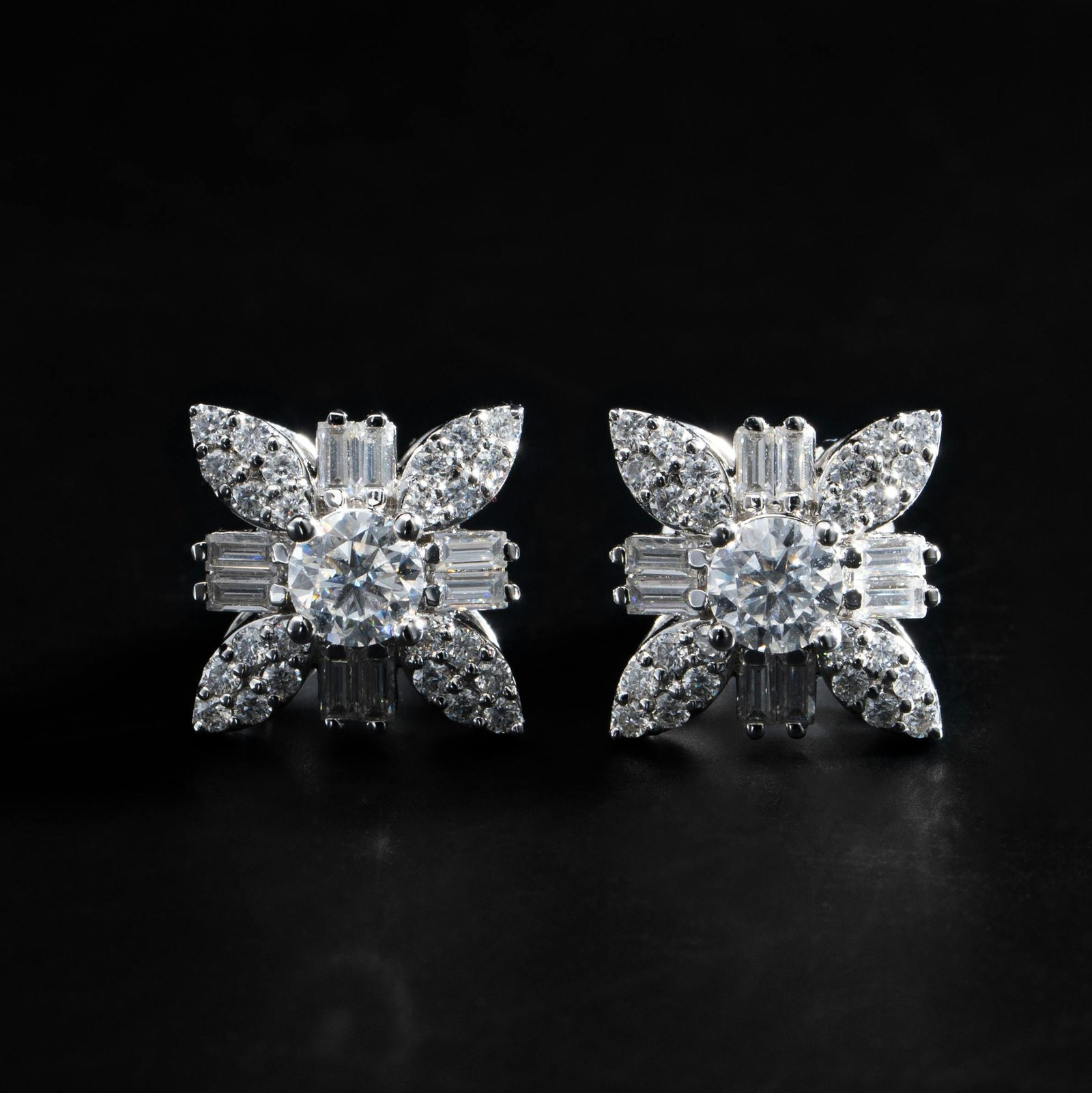 Elegant diamond stud earrings with floral design, perfect for luxury events.